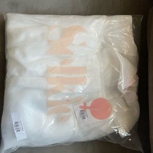 New with tags. Not even removed from plastic. Selkie the Ivory Puff Dress.